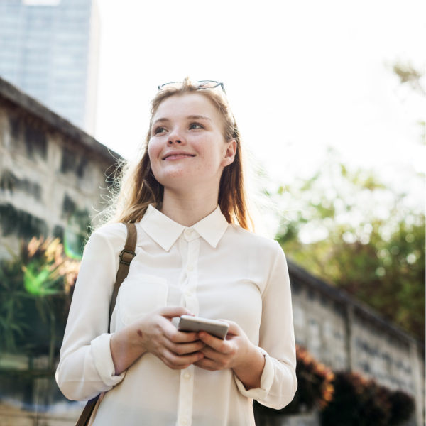 Girl Using Browsing Phone Concept